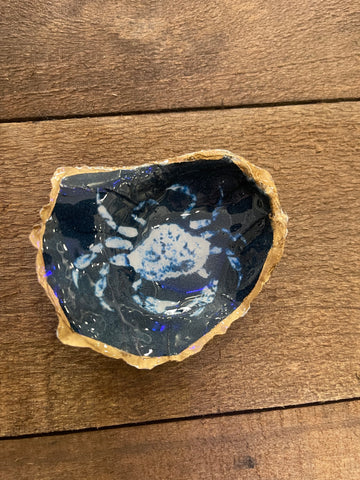 White on blue crab oyster shell